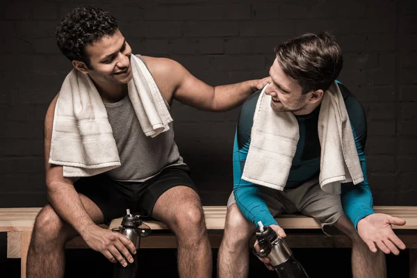 Athletes at locker room — Stock Photo