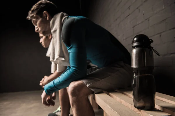 Athletes at locker room — Stock Photo