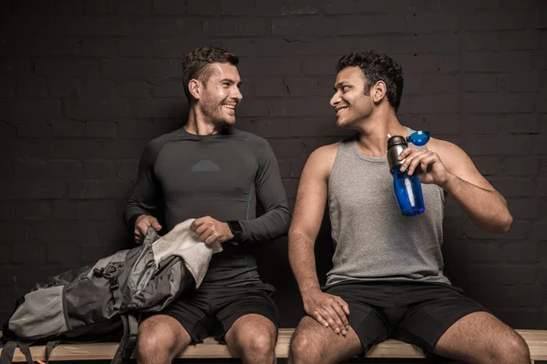 Athletes at locker room — Stock Photo