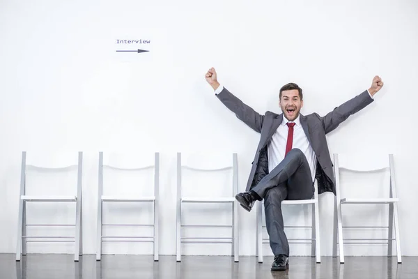 Excited businessman waiting for interview — Stock Photo