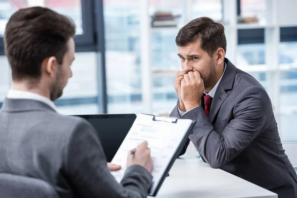 Businessmen at job interview — Stock Photo