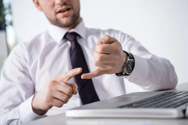 Businessman counting on fingers — Stock Photo