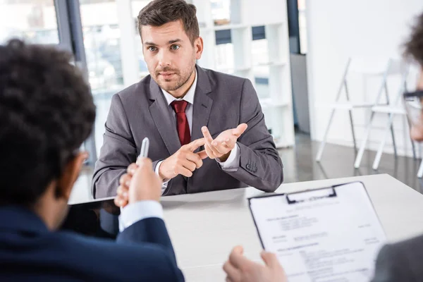 Businessmen at job interview — Stock Photo