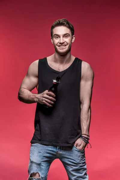 Young man with beer — Stock Photo