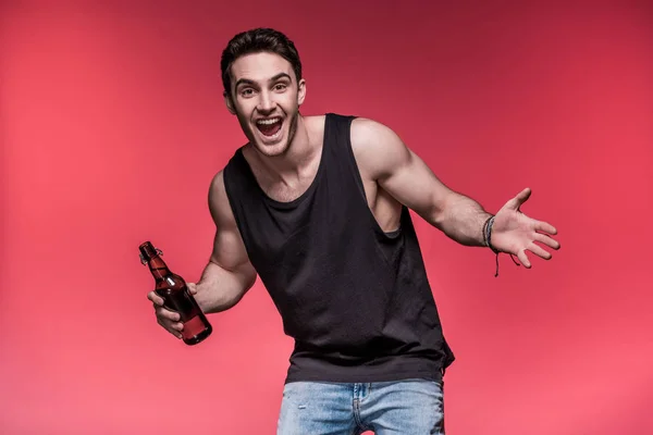 Young man with beer — Stock Photo