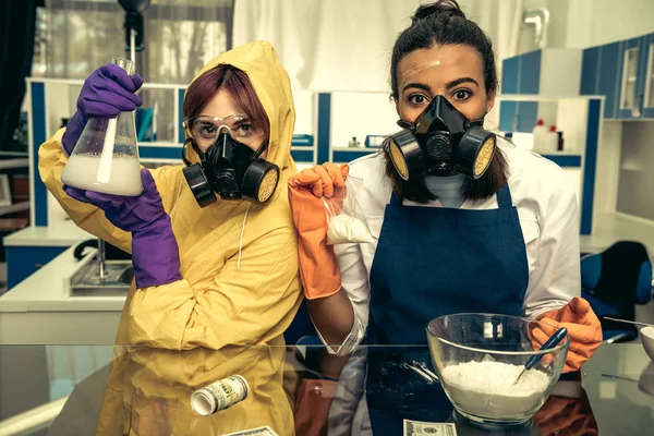 Women chemists at scientific laboratory with drugs — Stock Photo