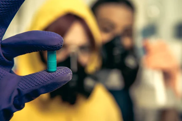 Women chemists at scientific laboratory with drugs — Stock Photo