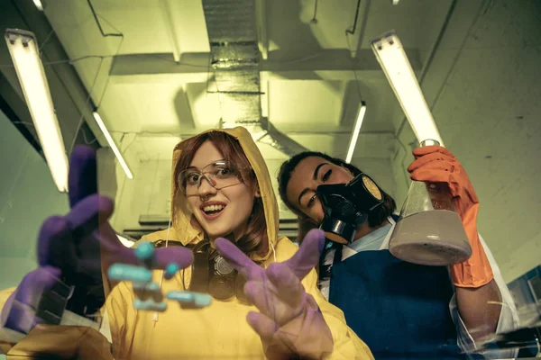 Women chemists at scientific laboratory with drugs — Stock Photo