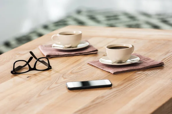Cups of coffee on table — Stock Photo