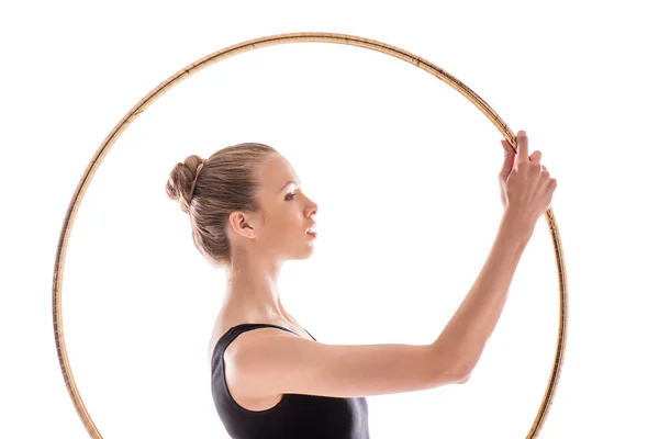 Rhythmic gymnast with hoop — Stock Photo