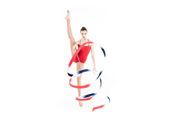 Woman rhythmic gymnast training with rope — Stock Photo