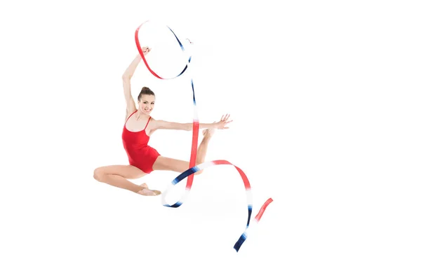 Rhythmische Sportgymnastin springt mit Seil — Stockfoto