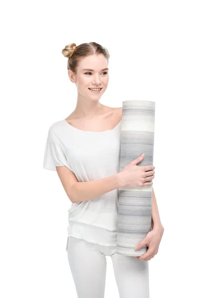 Girl holding yoga mat — Stock Photo