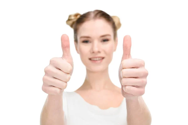 Girl showing thumbs up sign — Stock Photo