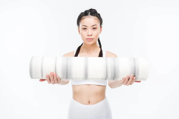 Asian girl with yoga mat — Stock Photo