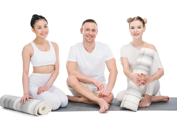 Women practicing yoga with trainer — Stock Photo
