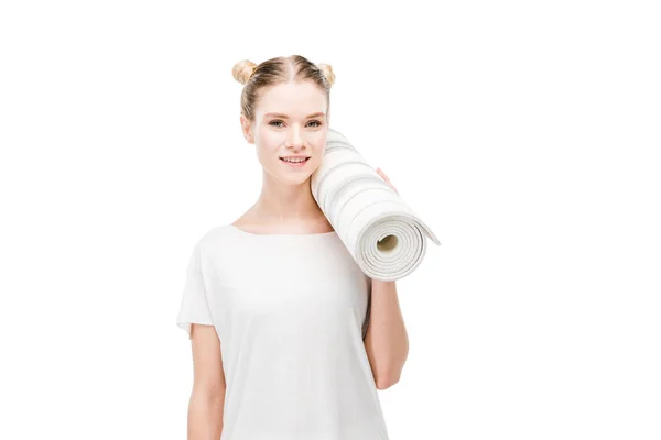 Дівчина тримає йогу килимок — стокове фото