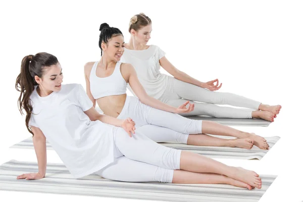 Women doing Side Plank Pose — Stock Photo