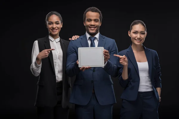 Business colleagues with digital tablet — Stock Photo