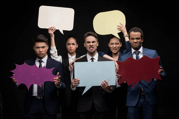 Empresarios con burbujas de habla en blanco - foto de stock