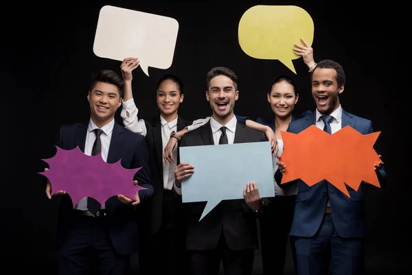 Businesspeople with blank speech bubbles — Stock Photo