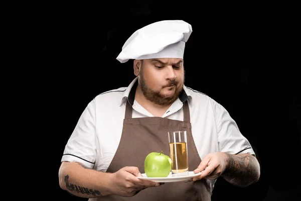 Cuisinière avec jus de pomme — Photo de stock