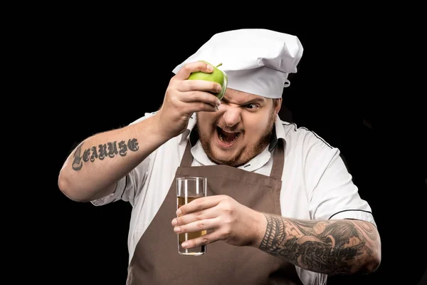 Cuisinière avec jus de pomme — Photo de stock