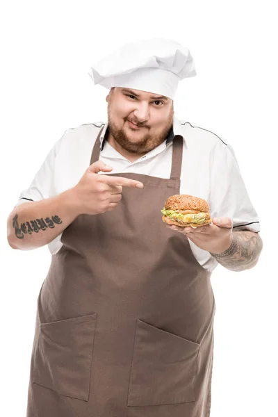 Cuisinière avec hamburger savoureux — Photo de stock