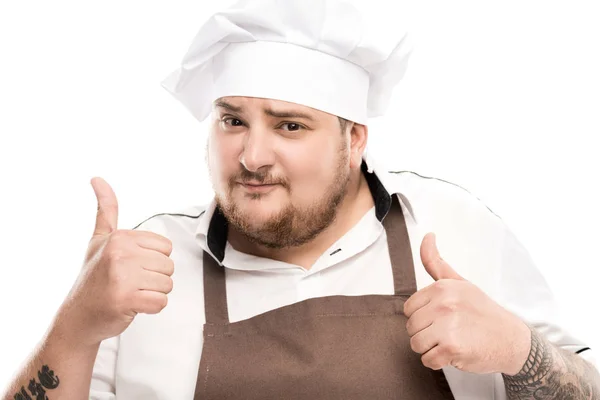 Cuisinière dans tablier et chapeau de chef — Photo de stock