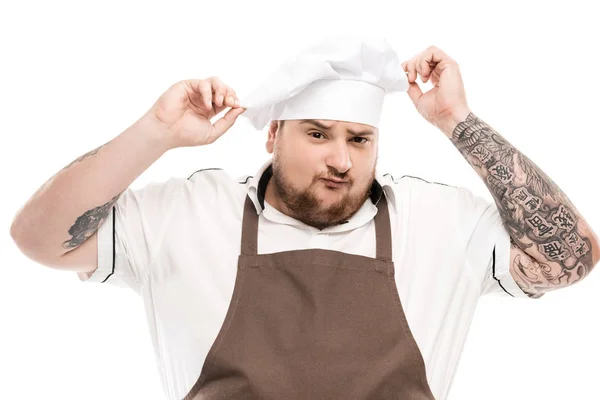 Fogão em avental e chapéu de chef — Fotografia de Stock