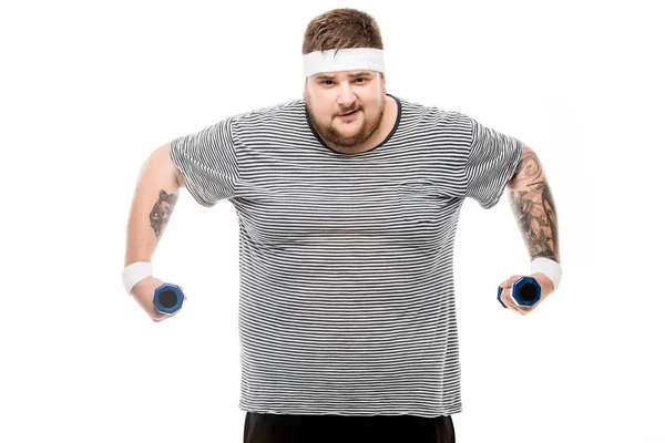 Hombre gordo haciendo ejercicio con pesas - foto de stock
