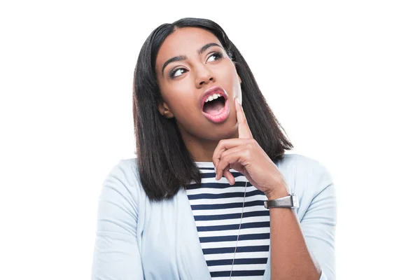 Woman with finger on cheek — Stock Photo