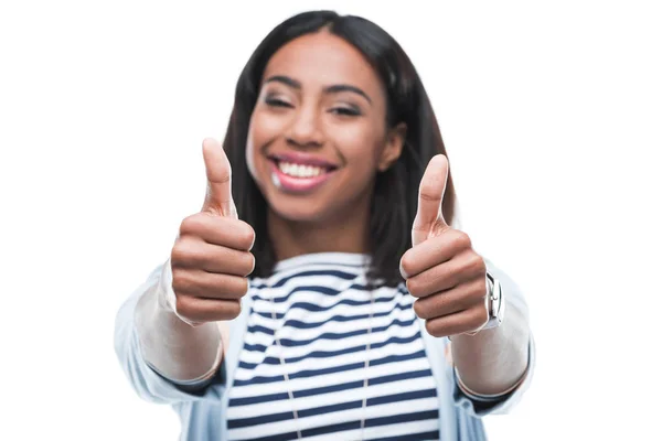 Young woman gesturing thumbs up — Stock Photo