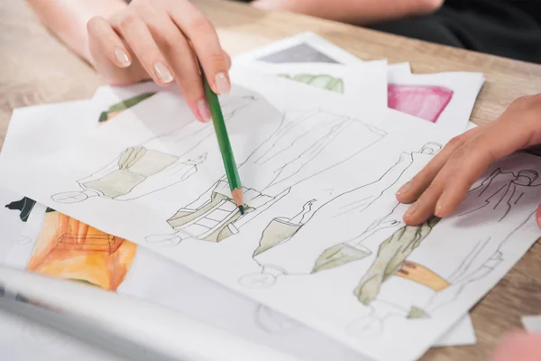Fashion designers working with blueprints — Stock Photo