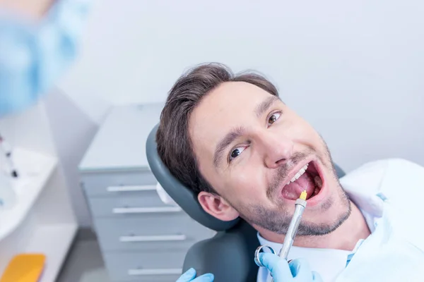 Dentist giving injection on anesthesia — Stock Photo