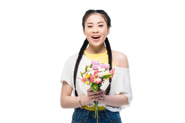 Asian girl holding flowers — Stock Photo