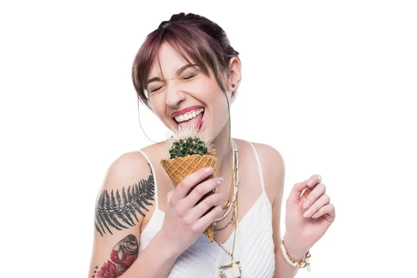 Woman eating cactus — Stock Photo