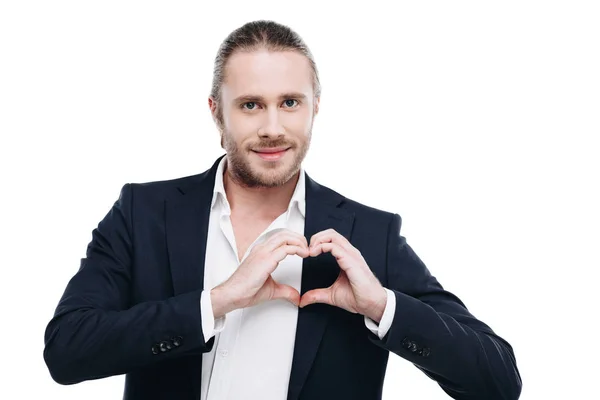 Uomo d'affari che mostra il segno del cuore — Foto stock