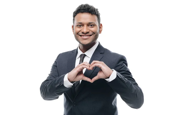 Businessman showing heart symbol — Stock Photo