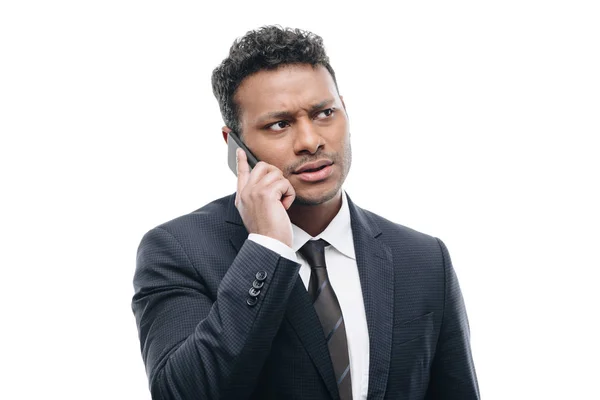 Businessman talking on smartphone — Stock Photo