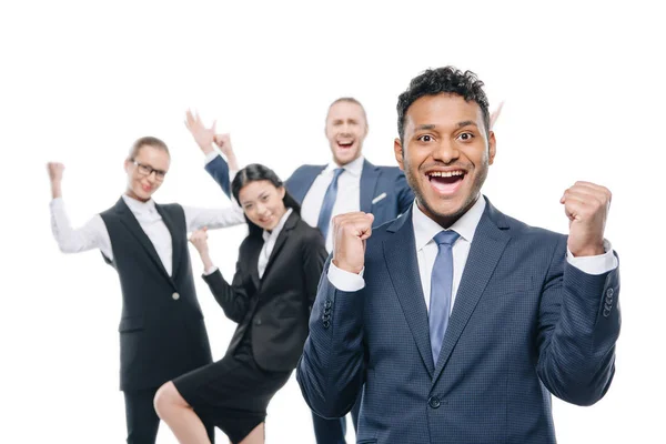 Excited businessman with colleagues — Stock Photo