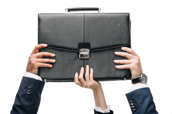 Businesspeople holding briefcase — Stock Photo