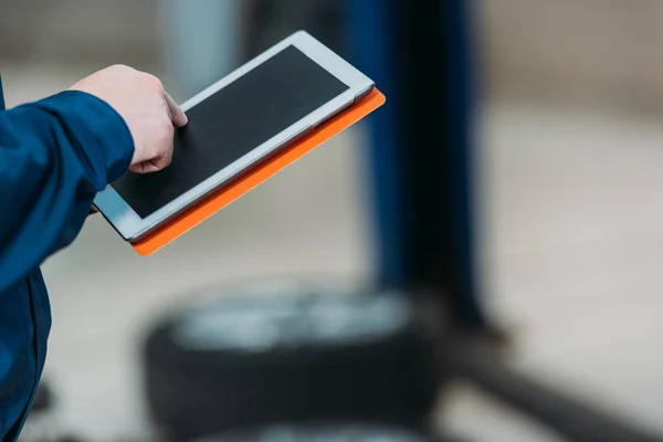 Male hand using digital tablet — Stock Photo