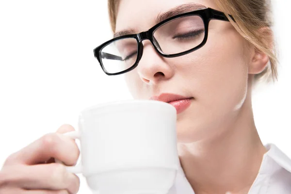 Woman holding coffee cup — Stock Photo