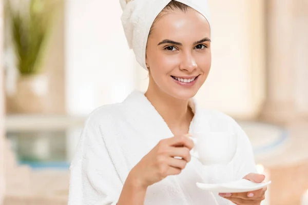 Woman drinking tea after spa — Stock Photo
