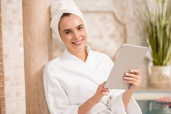 Woman with digital tablet after spa — Stock Photo