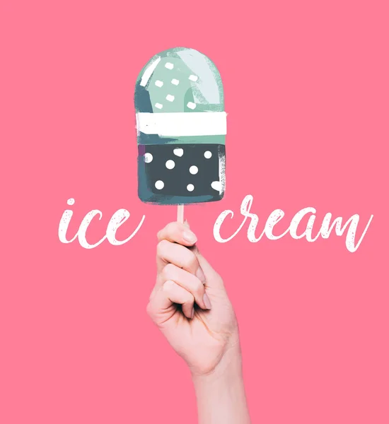 Hand holding ice cream — Stock Photo