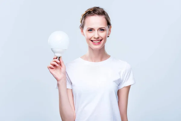 Mujer con bombilla - foto de stock