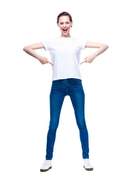 Woman pointing at white t-shirt — Stock Photo