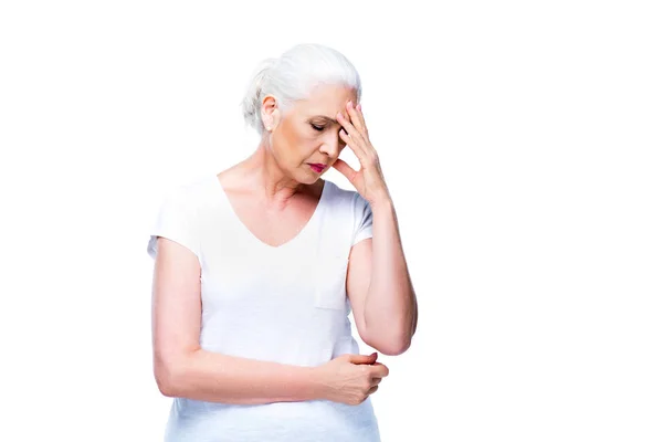 Senior woman with headache — Stock Photo